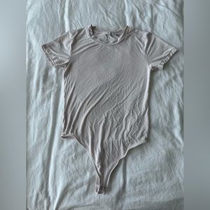 Light pink aritzia tshirt bodysuit